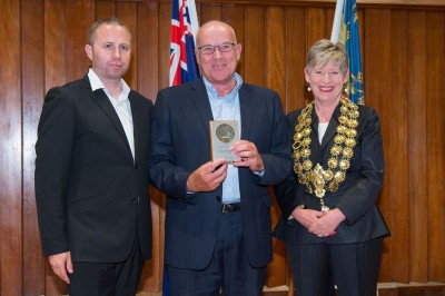 Bruce McEachen receiving his award