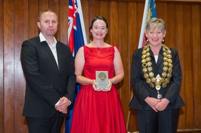 a representative of the trust receiving the award