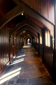 Photo of the timber corridor with a flagstone floor