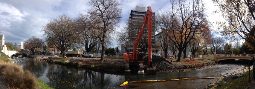 panoramic scene of a digger working in the Avon River in winter