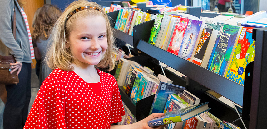 Child in community library